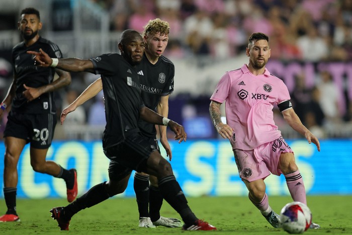 Aug 30, 2023; Fort Lauderdale, Florida, USA; Inter Miami forward Lionel Messi (10) kicks he ball past Nashville SC forward Jacob Shaffelburg (14) during the second half at DRV PNK Stadium. Mandatory Credit: Sam Navarro-USA TODAY Sports