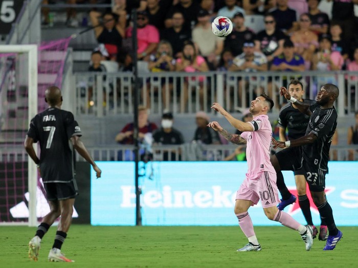 Aug 30, 2023; Fort Lauderdale, Florida, USA; Inter Miami forward Lionel Messi (10) kicks the ball past Nashville SC defender Jack Maher (5) during the second half at DRV PNK Stadium. Mandatory Credit: Sam Navarro-USA TODAY Sports