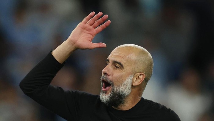 Soccer Football - Premier League - Manchester City v Newcastle United - Etihad Stadium, Manchester, Britain - August 19, 2023 Manchester City manager Pep Guardiola celebrates after the match REUTERS/Phil Noble EDITORIAL USE ONLY. No use with unauthorized audio, video, data, fixture lists, club/league logos or live services. Online in-match use limited to 75 images, no video emulation. No use in betting, games or single club /league/player publications.  Please contact your account representative for further details.