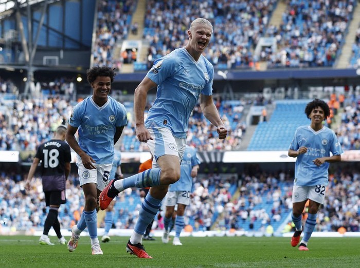 Soccer Football - Premier League - Manchester City v Fulham - Etihad Stadium, Manchester, Britain - September 2, 2023 Manchester City's Erling Braut Haaland celebrates scoring their fifth goal and his hat-trick Action Images via Reuters/Jason Cairnduff EDITORIAL USE ONLY. No use with unauthorized audio, video, data, fixture lists, club/league logos or 'live' services. Online in-match use limited to 75 images, no video emulation. No use in betting, games or single club /league/player publications.  Please contact your account representative for further details.