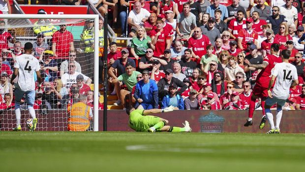 Liverpool's Darwin Nunez hits the post with a shot forcing an own goal by Aston Villa's Matty Cash during the English Premier League soccer match between Liverpool and Aston Villa at Anfield stadium in Liverpool, Sunday, Sept. 3, 2023. (AP Photo/Jon Super)