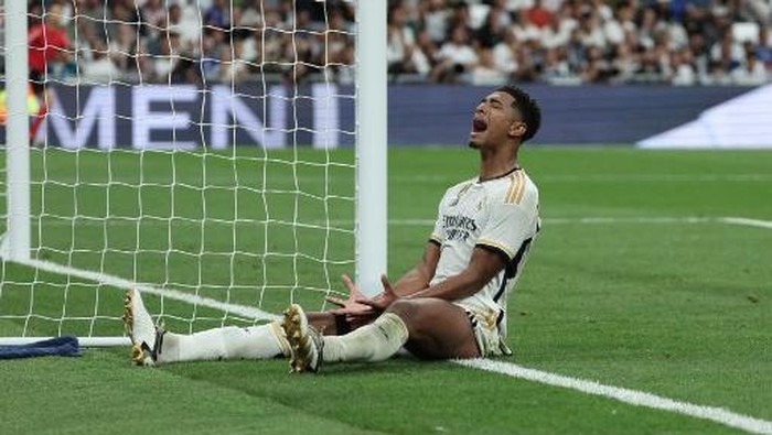 Real Madrids English midfielder #5 Jude Bellingham reacts during the Spanish Liga football match between Real Madrid CF and Getafe CF at the Santiago Bernabeu stadium in Madrid on September 2, 2023. (Photo by Thomas COEX / AFP)
