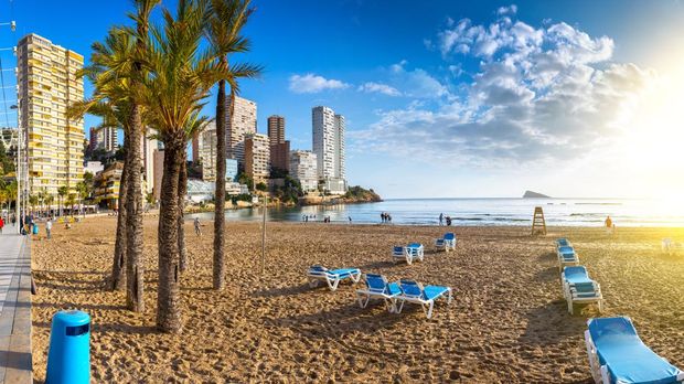 anoramic seascape view of summer resort with beach(Playa de Llevant) and famous skyscrapers. Costa Blanca. City of Benidorm, Alicante, Valencia, Spain.