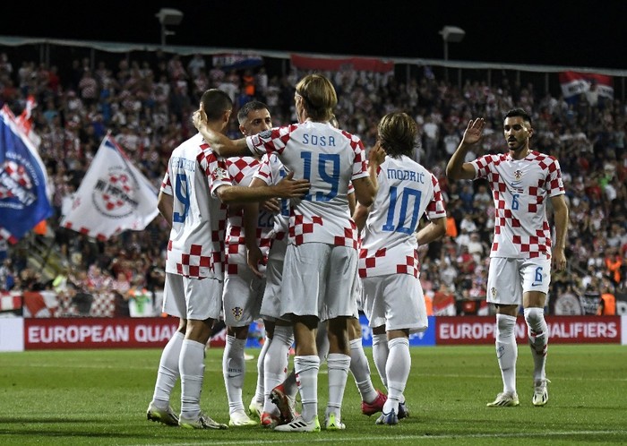 Croatias players celebrate scoring during the UEFA Euro 2024 football tournament group D qualification football match between Croatia and Latvia at the Rujevica Stadium in Rijeka, on September 08, 2023. (Photo by DENIS LOVROVIC / AFP)