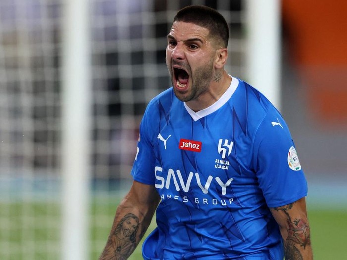 Hilal's Serbian forward #09 Aleksandar Mitrovic reacts after a goal during the Saudi Pro League football match between Al-Ittihad and Al-Hilal at Prince Abdullah al-Faisal Stadium in Jeddah on September 1, 2023. (Photo by AFP)
