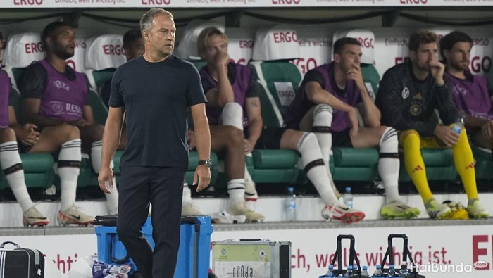 Germany head coach Hansi Flick observes during an international friendly soccer match between Germany and Japan in Wolfsburg, Germany, Saturday, Sept. 9, 2023. (AP Photo/Martin Meissner)