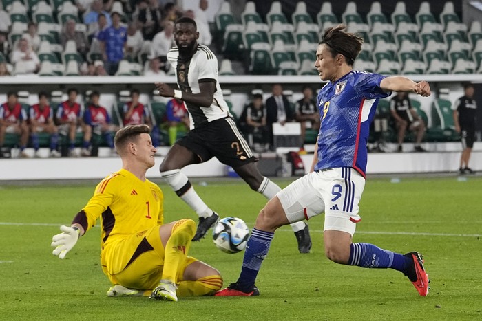 Germany goalkeeper Marc-Andre ter Stegen blocks Japans Ayase Ueda during an international friendly soccer match between Germany and Japan in Wolfsburg, Germany, Saturday, Sept. 9, 2023. (AP Photo/Martin Meissner)