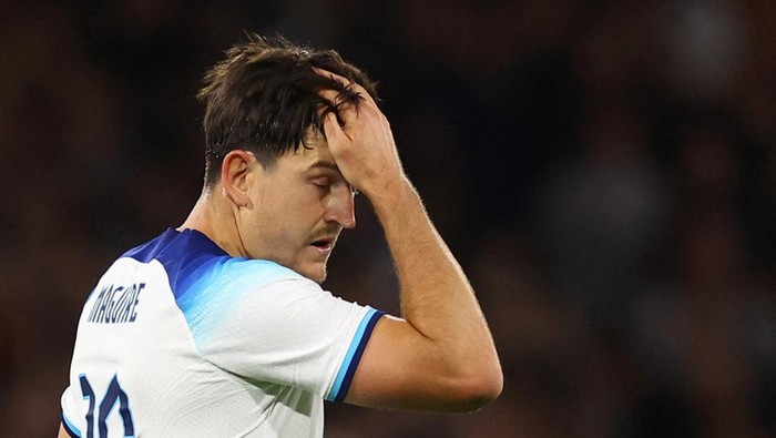 Soccer Football - International Friendly - Scotland v England - Glasgow, Scotland, Britain - September 12, 2023 Englands Harry Maguire looks dejected after scoring an own goal and Scotlands first REUTERS/Carl Recine