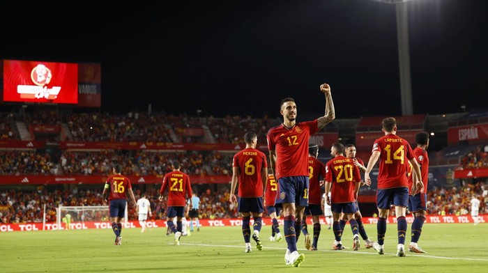 Spains Joselu, center, celebrates after scoring his sides third goal during the Euro 2024 group A qualifying soccer match between Spain and Cyprus in Granada, Spain, Tuesday, Sept. 12, 2023. (AP Photo/Fermin Rodriguez)