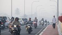 Potret Kabut Asap yang Kian Parah Menyelimuti Kota Palembang