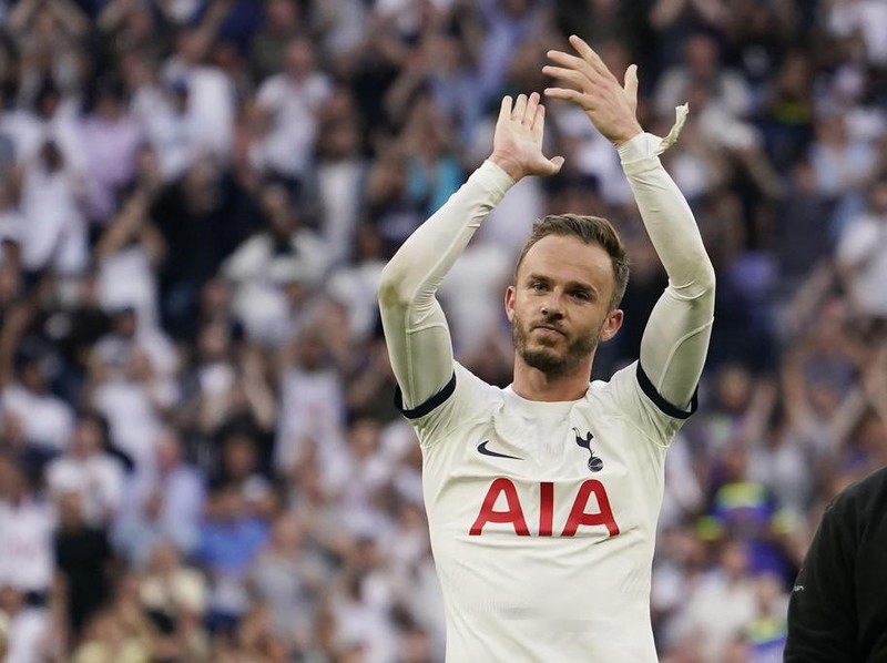 Tottenham's James Maddison celebrates after the Premier League soccer match between Tottenham Hotspur and Manchester United at the Tottenham Hotspur Stadium in London, England, Saturday, Aug. 19, 2023. (AP Photo/Alberto Pezzali)