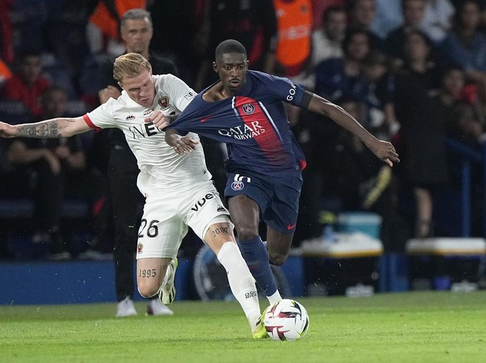PSG's Kylian Mbappe reacts after missing a scoring chance during the French League One soccer match between Paris Saint Germain and Nice at Parc des Princes stadium in Paris, Friday, Sept. 15, 2023. (AP Photo/Michel Euler)
