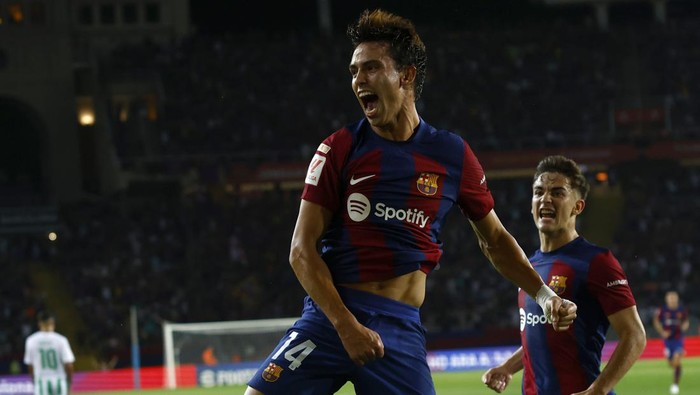 Barcelonas Joao Felix celebrates after scoring his sides first goal during a Spanish La Liga soccer match between Barcelona and Betis at the Olympic Stadium of Montjuic in Barcelona, Spain, Saturday, Sept. 16, 2023. (AP Photo/Joan Monfort)