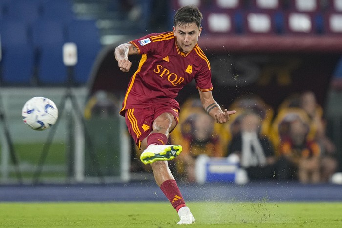 Romas Paulo Dybala takes a free kick during a Serie A soccer match between Roma and Empoli, at Romes Olympic stadium, Sunday, Sept. 17, 2023. (AP Photo/Alessandra Tarantino)