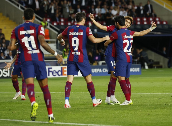 Soccer Football - Champions League - Group H - FC Barcelona v Royal Antwerp - Estadi Olimpic Lluis Companys, Barcelona, Spain - September 19, 2023 FC Barcelonas Joao Felix celebrates scoring their first goal with Ilkay Gundogan REUTERS/Albert Gea