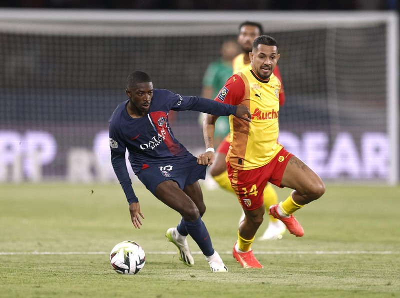 Soccer Football - Ligue 1 - Olympique Lyonnais v Paris St Germain - Groupama Stadium, Lyon, France - September 3, 2023 Paris St Germain's Ousmane Dembele reacts REUTERS/Gonzalo Fuentes