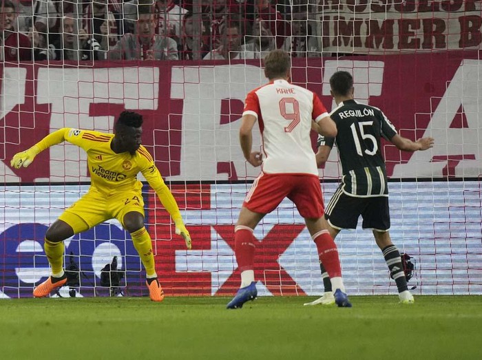 Bayern's Leroy Sane, centre, celebrates after scoring his side's opening goal during the Champions League group A soccer match between Bayern Munich and Manchester United at the Allianz Arena stadium in Munich, Germany, Wednesday, Sept. 20, 2023. (AP Photo/Matthias Schrader)