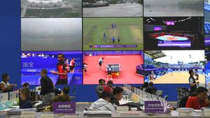 Potret Kesibukan Jurnalis di Media Center Asian Games Hangzhou