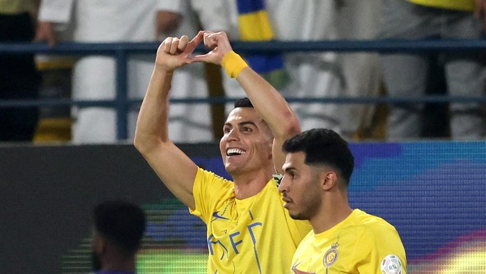 Soccer Football - Saudi Pro League - Al Nassr v Al Ahli - Al-Awwal Park, Riyadh, Saudi Arabia - September 22, 2023 Al Nassrs Cristiano Ronaldo celebrates scoring their second goal REUTERS/Ahmed Yosri
