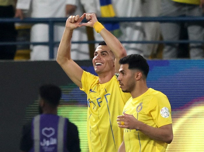 Soccer Football - Saudi Pro League - Al Nassr v Al Ahli - Al-Awwal Park, Riyadh, Saudi Arabia - September 22, 2023 Al Nassr's Cristiano Ronaldo celebrates scoring their second goal REUTERS/Ahmed Yosri