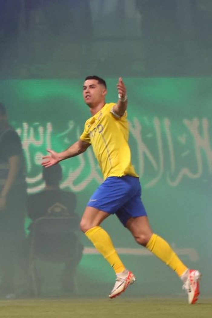Cristiano Ronaldo Nassr's Portuguese forward #07 Cristiano Ronaldo celebrates scoring during the Saudi Pro League football match between Al-Nassr and Al-Ahli at the King Saud University Stadium in Riyadh, on September 22, 2023. (Photo by Fayez NURELDINE / AFP)