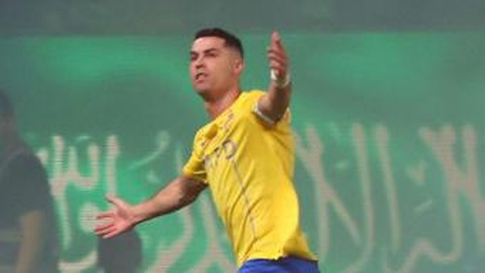 Nassrs Portuguese forward #07 Cristiano Ronaldo celebrates scoring during the Saudi Pro League football match between Al-Nassr and Al-Ahli at the King Saud University Stadium in Riyadh, on September 22, 2023. (Photo by Fayez NURELDINE / AFP)