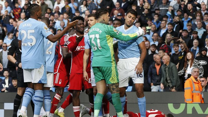 Soccer Football - Premier League - Manchester City v Nottingham Forest - Etihad Stadium, Manchester, Britain - September 23, 2023 Manchester Citys Rodri reacts after being shown a red card by referee Anthony Taylor Action Images via Reuters/Ed Sykes NO USE WITH UNAUTHORIZED AUDIO, VIDEO, DATA, FIXTURE LISTS, CLUB/LEAGUE LOGOS OR LIVE SERVICES. ONLINE IN-MATCH USE LIMITED TO 45 IMAGES, NO VIDEO EMULATION. NO USE IN BETTING, GAMES OR SINGLE CLUB/LEAGUE/PLAYER PUBLICATIONS.