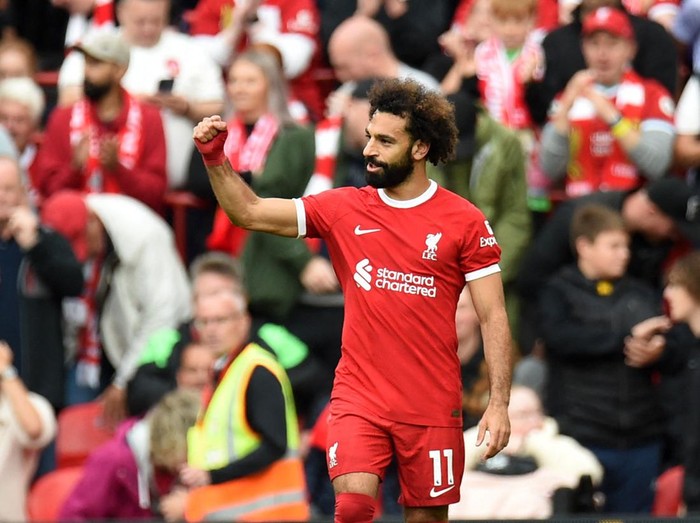 Soccer Football - Premier League - Liverpool v West Ham United - Anfield, Liverpool, Britain - September 24, 2023 Liverpool's Mohamed Salah celebrates scoring their first goal REUTERS/Peter Powell NO USE WITH UNAUTHORIZED AUDIO, VIDEO, DATA, FIXTURE LISTS, CLUB/LEAGUE LOGOS OR 'LIVE' SERVICES. ONLINE IN-MATCH USE LIMITED TO 45 IMAGES, NO VIDEO EMULATION. NO USE IN BETTING, GAMES OR SINGLE CLUB/LEAGUE/PLAYER PUBLICATIONS.