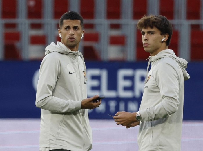Soccer Football - LaLiga - Osasuna v Barcelona - El Sadar Stadium, Pamplona, Spain  - September 3, 2023 Barcelona's Joao Felix and Joao Cancelo on the pitch before the match REUTERS/Vincent West