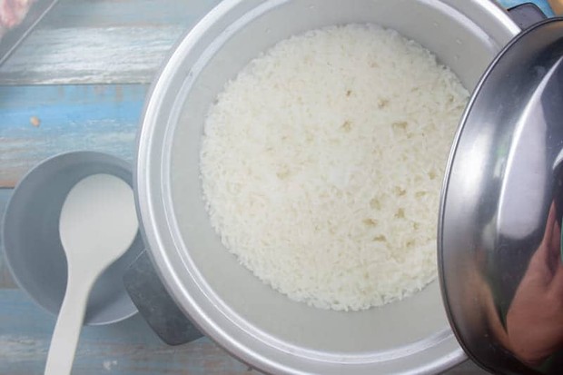 Cook rice in a rice cooker