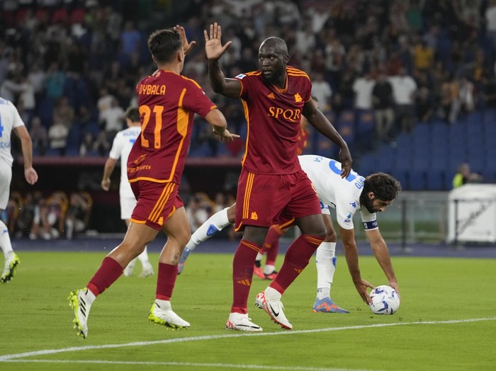 Romas Romelu Lukaku, right, and Romas Paulo Dybala celebrate after Renato Sanches scored their sides second goal during a Serie A soccer match between Roma and Empoli, at Romes Olympic stadium, Sunday, Sept. 17, 2023. (AP Photo/Alessandra Tarantino)