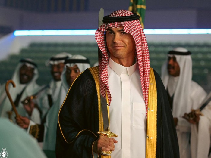 Soccer Football - Saudi Pro League - Al Nassr celebrate Saudi 93rd national day - Al Nassr Club, Riyadh, Saudi Arabia - September 23, 2023 Al Nassr's Cristiano Ronaldo dressed in Saudi national clothing celebrates Saudi 93rd national day Al Nassr Football Club Media Office/Handout via REUTERS  ATTENTION EDITORS - THIS IMAGE HAS BEEN SUPPLIED BY A THIRD PARTY. NO RESALES. NO ARCHIVES