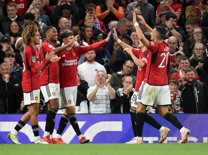 Soccer Football - Carabao Cup - Third Round - Manchester United v Crystal Palace - Old Trafford, Manchester, Britain - September 26, 2023 Manchester Uniteds Anthony Martial celebrates scoring their third goal with teammates REUTERS/Peter Powell NO USE WITH UNAUTHORIZED AUDIO, VIDEO, DATA, FIXTURE LISTS, CLUB/LEAGUE LOGOS OR LIVE SERVICES. ONLINE IN-MATCH USE LIMITED TO 45 IMAGES, NO VIDEO EMULATION. NO USE IN BETTING, GAMES OR SINGLE CLUB/LEAGUE/PLAYER PUBLICATIONS.