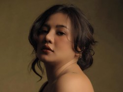 Mawar Butterfly dan Tato di Tubuhnya