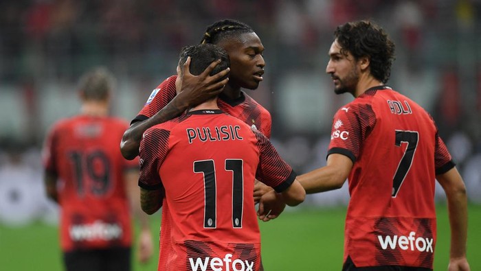 Soccer Football - Serie A - AC Milan v Lazio - San Siro, Milan, Italy - September 30, 2023 AC Milans Christian Pulisic celebrates scoring their first goal with Rafael Leao and Yacine Adli REUTERS/Daniele Mascolo