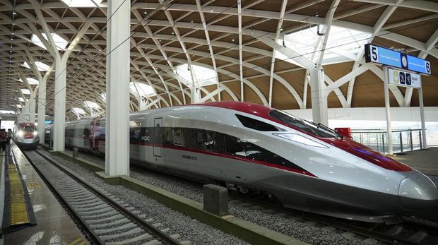 High-speed train is parked during the opening ceremony for launching Southeast Asia's first high-speed railway at Halim station in Jakarta, Indonesia, Monday, Oct. 2, 2023. Indonesian President Joko Widodo launched Southeast Asia's first high-speed railway that will start its commercial operations on Monday, a key project under China's Belt and Road infrastructure initiative that will cut travel time between two cities from the current three hours to about 40 minutes. (AP Photo/Achmad Ibrahim)