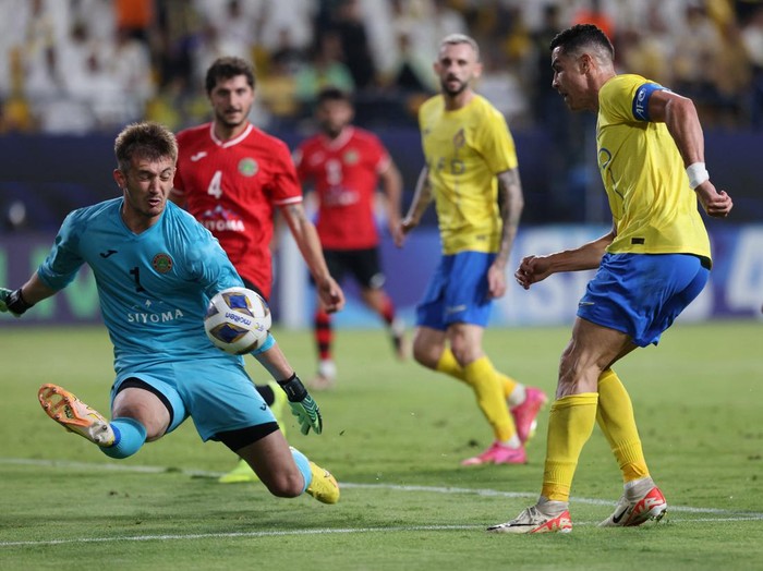 Soccer Football - Asian Champions League - Group E - Al-Nassr v FC Istiklol - Al-Awwal Park, Riyadh, Saudi Arabia - October 2, 2023 Al Nassr's Cristiano Ronaldo scores their first goal REUTERS/Ahmed Yosri