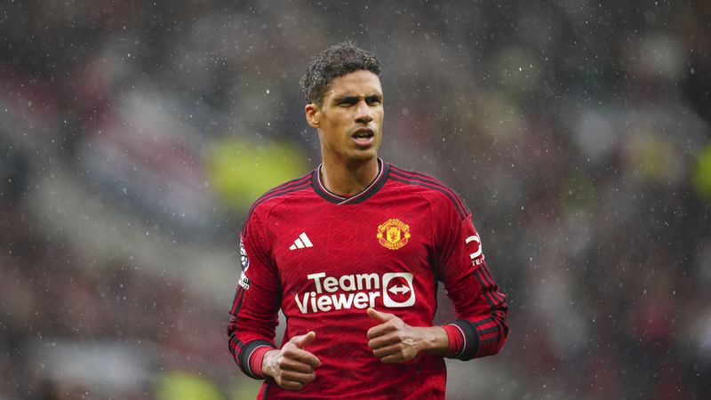 Manchester United's Raphael Varane runs on the pitch during the English Premier League soccer match between Manchester United and Crystal Palace at the Old Trafford stadium stadium in Manchester, England, Saturday, Sept. 30, 2023. (AP Photo/Jon Super)