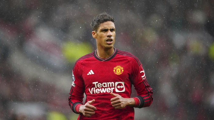 Manchester Uniteds Raphael Varane runs on the pitch during the English Premier League soccer match between Manchester United and Crystal Palace at the Old Trafford stadium stadium in Manchester, England, Saturday, Sept. 30, 2023. (AP Photo/Jon Super)