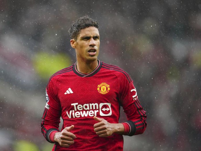 Manchester United's Raphael Varane runs on the pitch during the English Premier League soccer match between Manchester United and Crystal Palace at the Old Trafford stadium stadium in Manchester, England, Saturday, Sept. 30, 2023. (AP Photo/Jon Super)