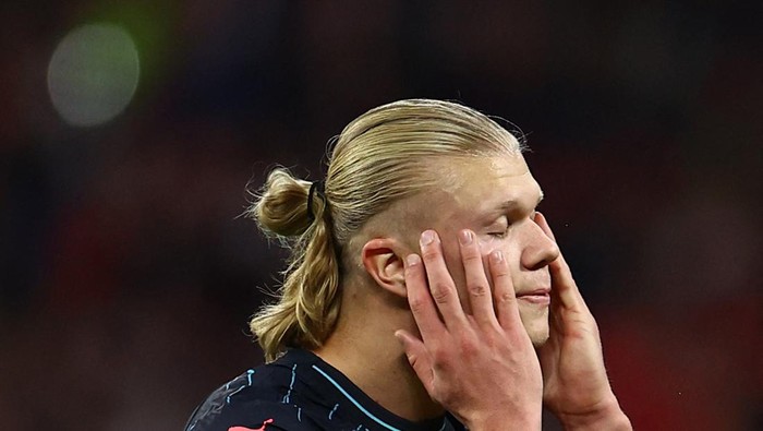 Soccer Football - Champions League - Group G - RB Leipzig v Manchester City - Red Bull Arena, Leipzig, Germany - October 4, 2023  Manchester Citys Erling Braut Haaland reacts REUTERS/Lisi Niesner