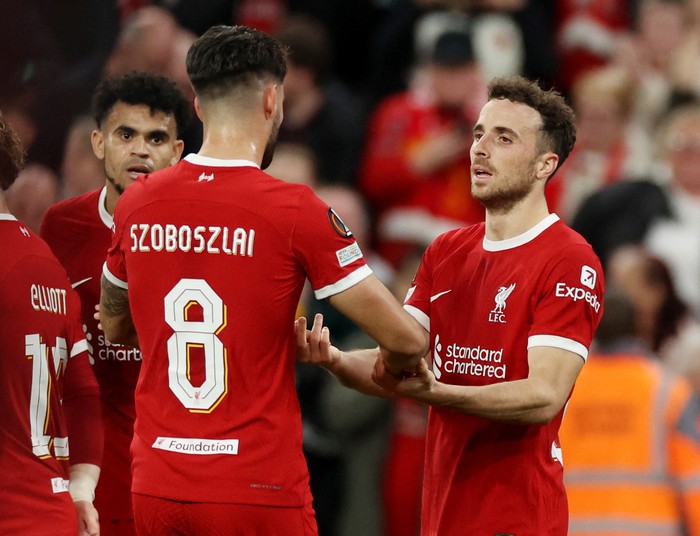 Soccer Football - Europa League - Group E - Liverpool v Union Saint-Gilloise - Anfield, Liverpool, Britain - October 5, 2023 Liverpools Diogo Jota celebrates scoring their second goal with Dominik Szoboszlai REUTERS/Phil Noble