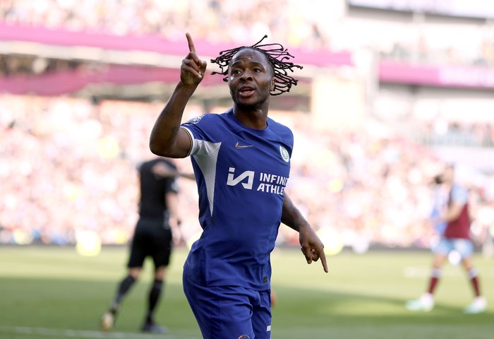 Chelseas Raheem Sterling celebrates scoring his sides third goal of the game, during the English Premier League soccer match between Burnley and Chelsea,  at Turf Moor, in Burnley, England, Saturday, Oct. 7, 2023. (Richard Sellers/PA via AP)