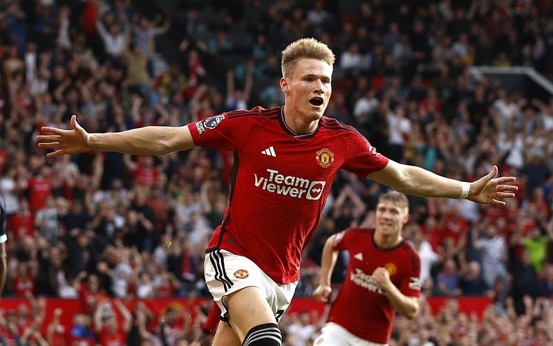 Soccer Football - Premier League - Manchester United v Brentford - Old Trafford, Manchester, Britain - October 7, 2023 Manchester United's Scott McTominay celebrates scoring their second goal Action Images via Reuters/Jason Cairnduff NO USE WITH UNAUTHORIZED AUDIO, VIDEO, DATA, FIXTURE LISTS, CLUB/LEAGUE LOGOS OR 'LIVE' SERVICES. ONLINE IN-MATCH USE LIMITED TO 45 IMAGES, NO VIDEO EMULATION. NO USE IN BETTING, GAMES OR SINGLE CLUB/LEAGUE/PLAYER PUBLICATIONS.