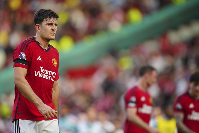 Manchester Uniteds Harry Maguire, left, reacts during the English Premier League soccer match between Manchester United and Brentford at the Old Trafford stadium in Manchester, England, Saturday, Oct. 7, 2023.(AP Photo/Jon Super)