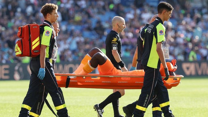 Clermont-Ferrands French goalkeeper #99 Mory Diaw injured by a firecracker, is evacuated on a stretcher  during the French L1 football match between Montpellier Herault SC and Clermont Foot 63  at Stade de la Mosson in Montpellier, southern France on October 8, 2023. (Photo by Pascal GUYOT / AFP)