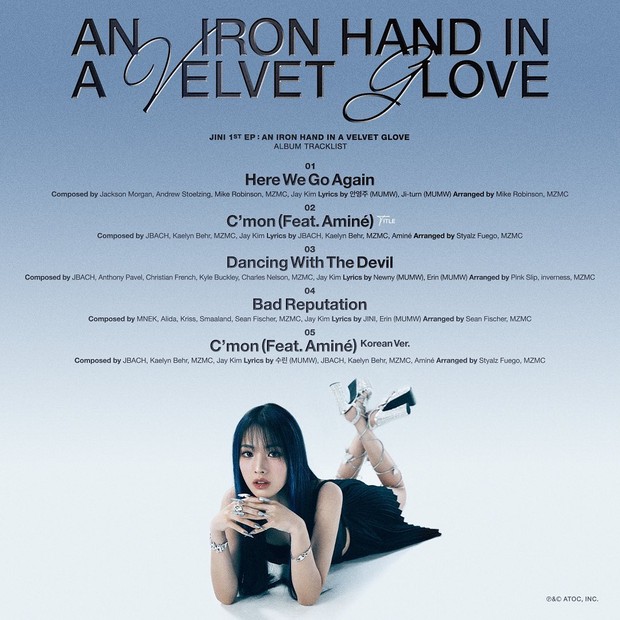 Potret JINI dalam foto konsep album debut 'An Iron Hand In A Velvet Glove'/ Foto: instagram.com/atoc_official Potret JINI dalam foto konsep album debut 'An Iron Hand In A Velvet Glove'