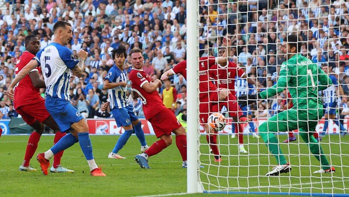Soccer Football - Premier League - Brighton & Hove Albion v Liverpool - The American Express Community Stadium, Brighton, Britain - October 8, 2023 Brighton & Hove Albions Lewis Dunk scores their second goal REUTERS/Toby Melville NO USE WITH UNAUTHORIZED AUDIO, VIDEO, DATA, FIXTURE LISTS, CLUB/LEAGUE LOGOS OR LIVE SERVICES. ONLINE IN-MATCH USE LIMITED TO 45 IMAGES, NO VIDEO EMULATION. NO USE IN BETTING, GAMES OR SINGLE CLUB/LEAGUE/PLAYER PUBLICATIONS.