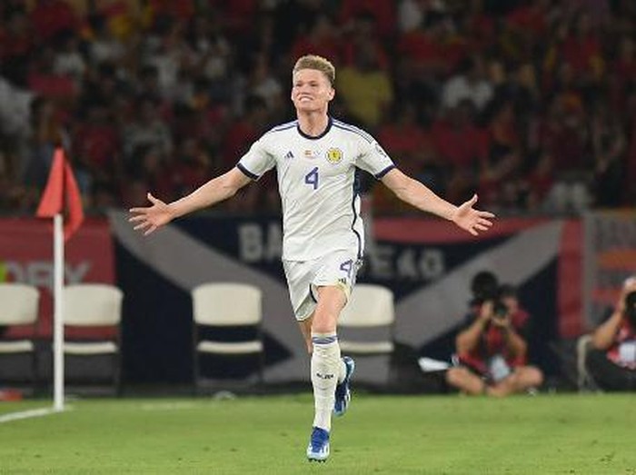 Scotland's midfielder #04 Scott McTominay celebrates scoring a goal that was later annulled during the EURO 2024 first round group A qualifying football match between Spain and Scotland at the La Cartuja stadium in Seville on October 12, 2023. (Photo by JORGE GUERRERO / AFP)