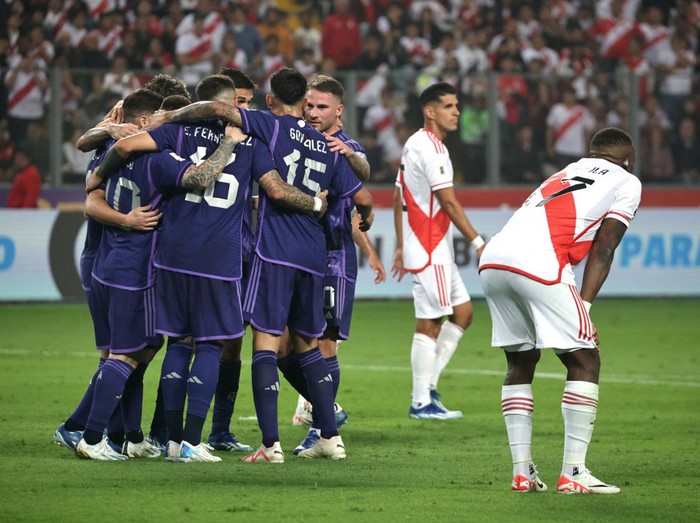 Soccer Football - World Cup - South American Qualifiers - Peru v Argentina - Estadio Nacional, Lima, Peru - October 17, 2023 Argentina's Lionel Messi celebrates with teammates after scoring a goal that was later disallowed REUTERS/Sebastian Castaneda